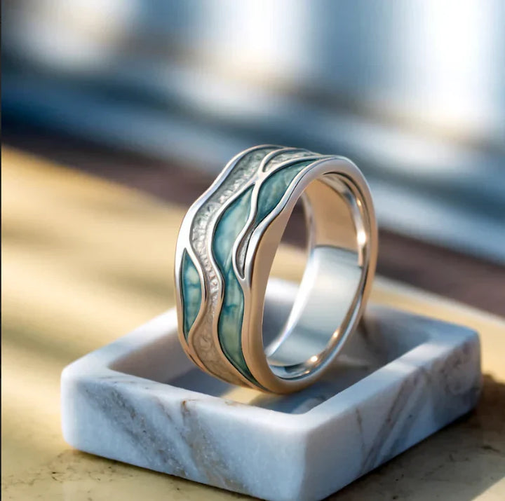 Turkoois ring met zilveren golven