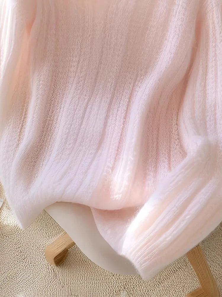 Roze pullover en gebreide lange mouwen zonder patroon