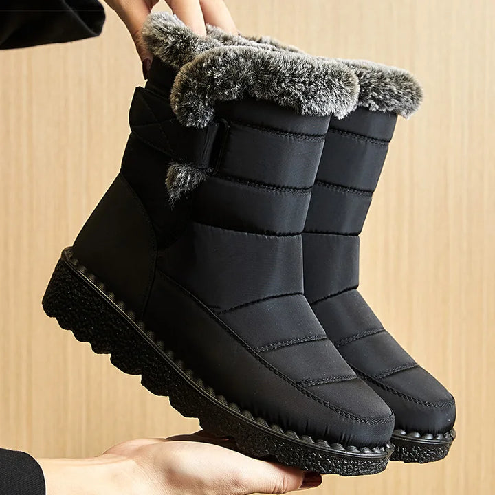 Evi gevoerde enkelboots met bontkraag in zwart