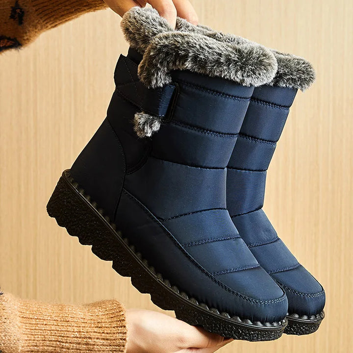 Evi gevoerde enkelboots met bontkraag in blauw