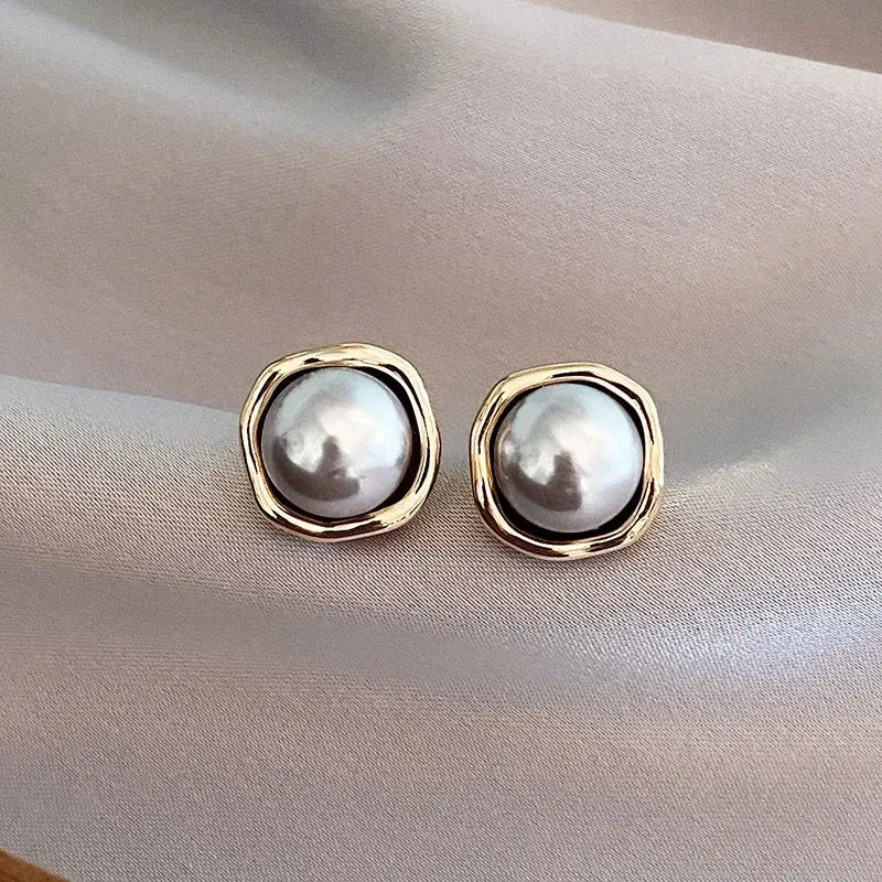 Elegante oorbellen met zwarte parels