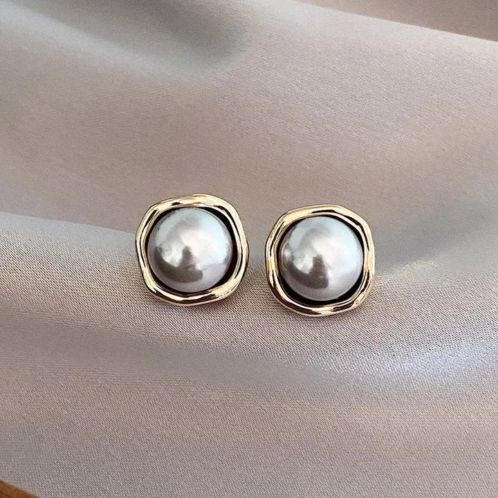 Elegante oorbellen met zwarte parels